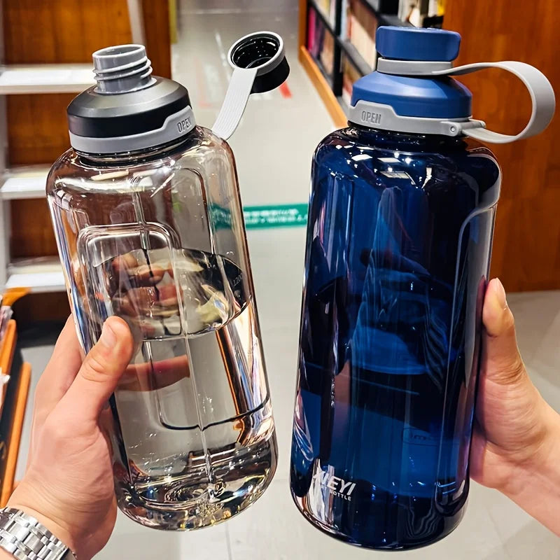 Large-capacity portable water bottle, made of high-transparency, drop-resistant PC material, with a leak-proof handle. Merch Eternally