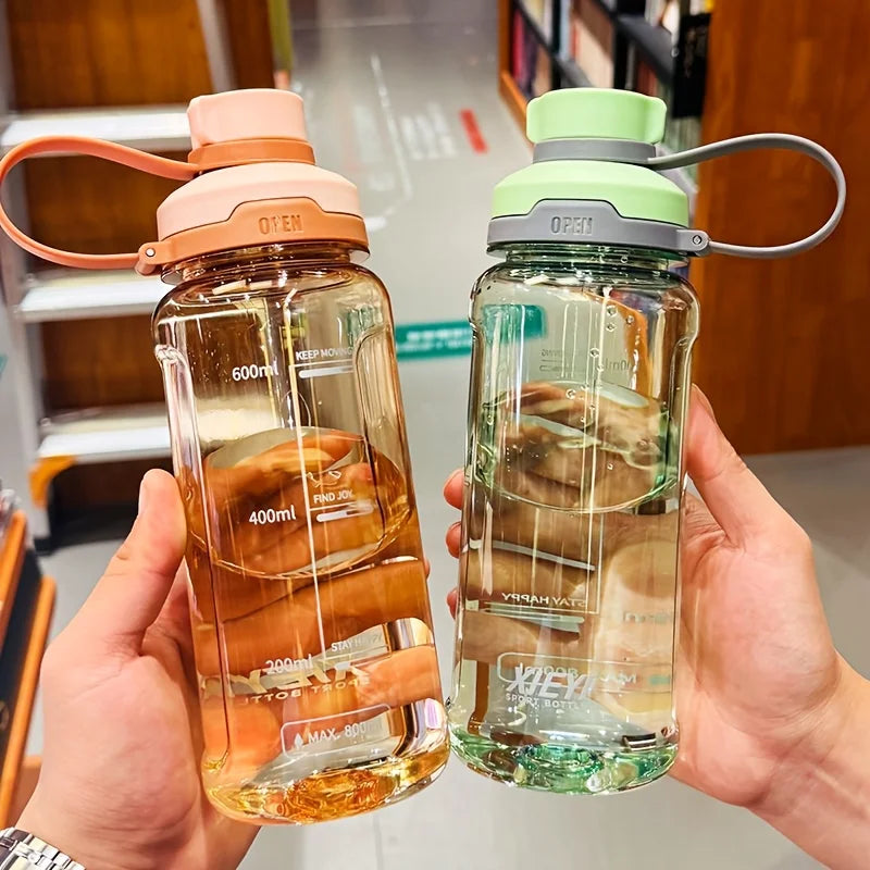 Large-capacity portable water bottle, made of high-transparency, drop-resistant PC material, with a leak-proof handle. Merch Eternally